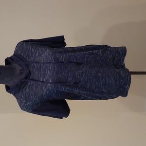 A boy's black hooded short sleeve shirt